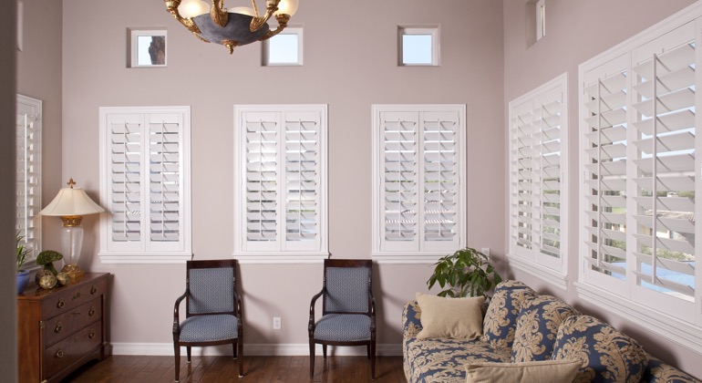 Modern sunroom with casement shutters