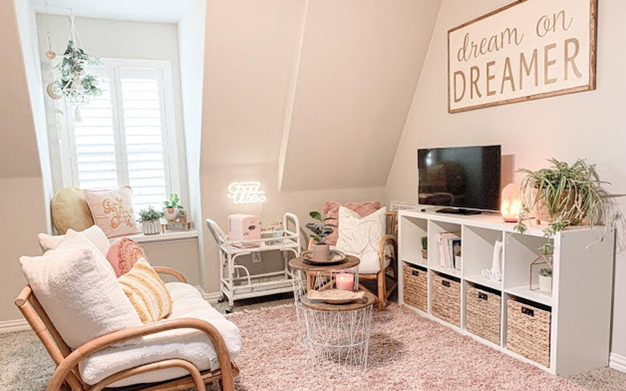 White polywood shutters in a cozy pink room.