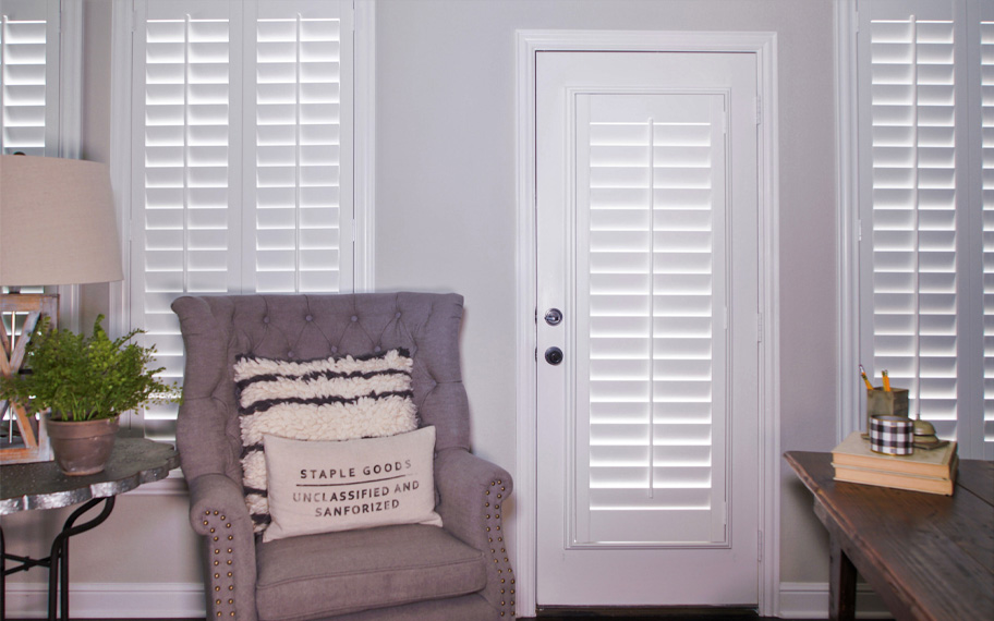 Interior shutters are beautiful and durable window treatments for glass doors in New York. Polywood shutters on a door