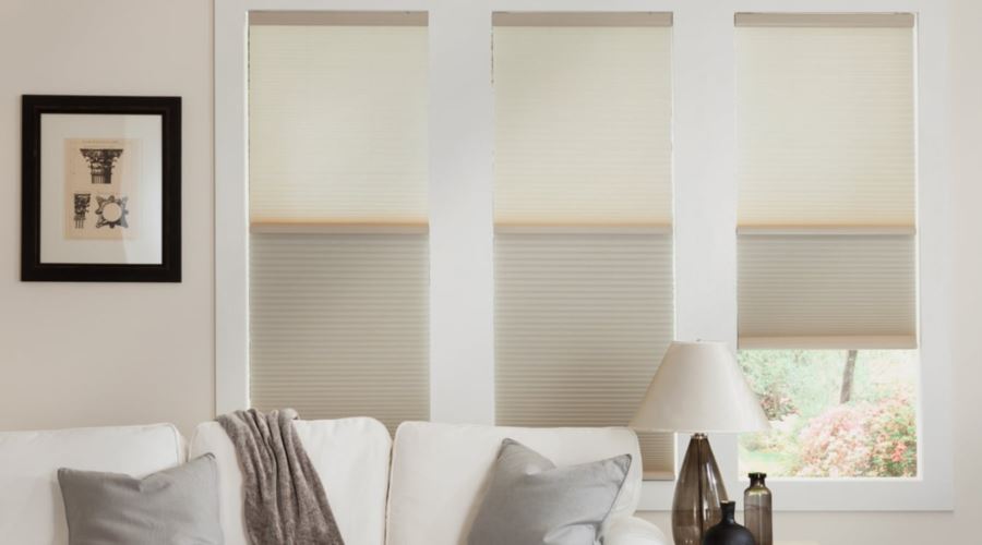 Cellular shades are energy efficient and stop air from entering through your window. Cellular shades in a New York living room
