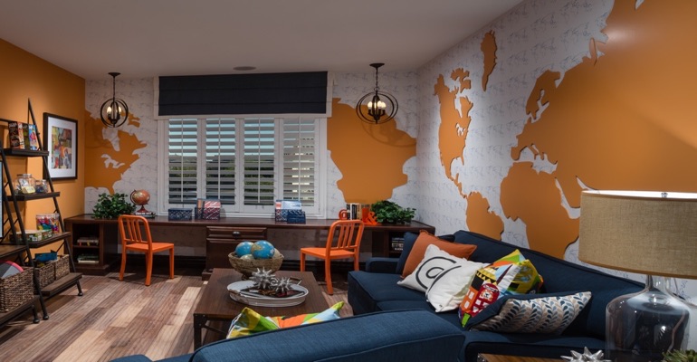 Plantation shutters are the perfect window treatment for a study center. Family room with wall map and plantation shutters