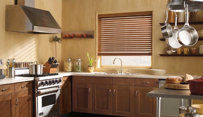 Faux wood blinds look stunning in New York kitchens. New York kitchen faux wood blinds.