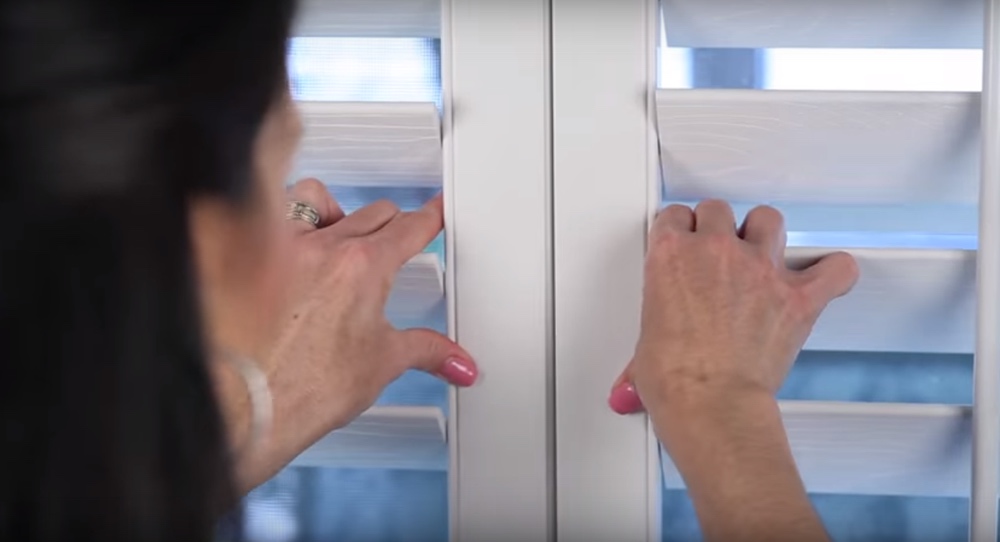 Closing The Panels Of Your Energy Efficient Shutters In New York City, NY Shutting plantation shutters